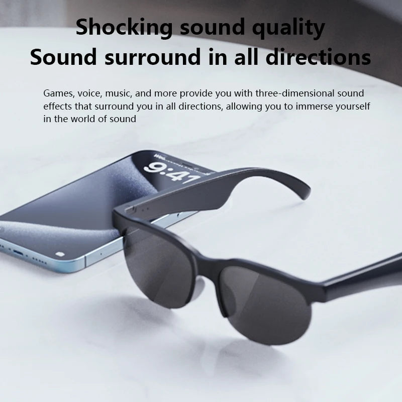 LinguaLens audio sunglasses on a table next to a phone